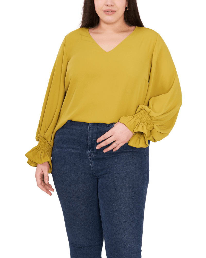 Front of a model wearing a size 1X Allie V-Neck Blouse in Avocado by Vince Camuto. | dia_product_style_image_id:261041
